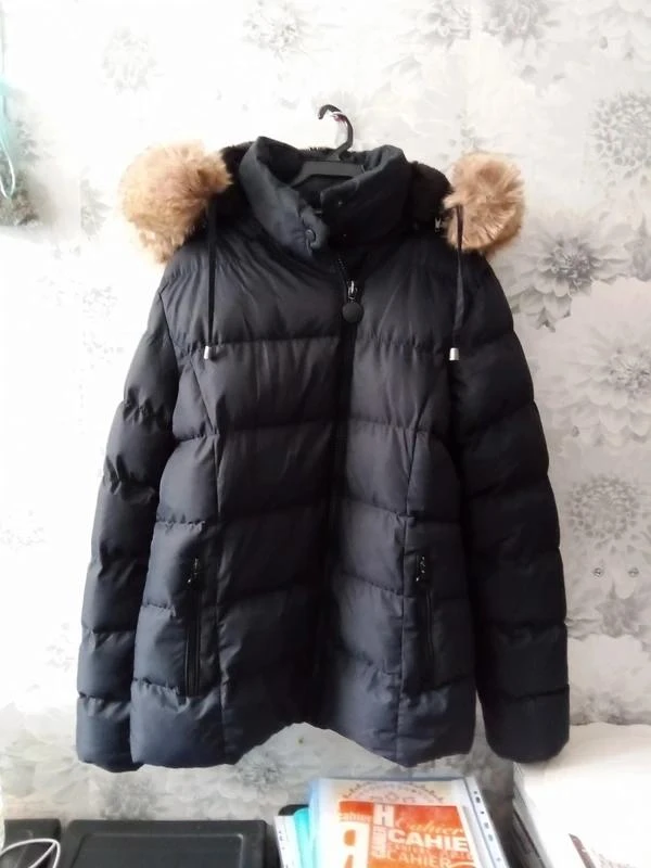 Manteau noir pour femme xl , en très bon état.